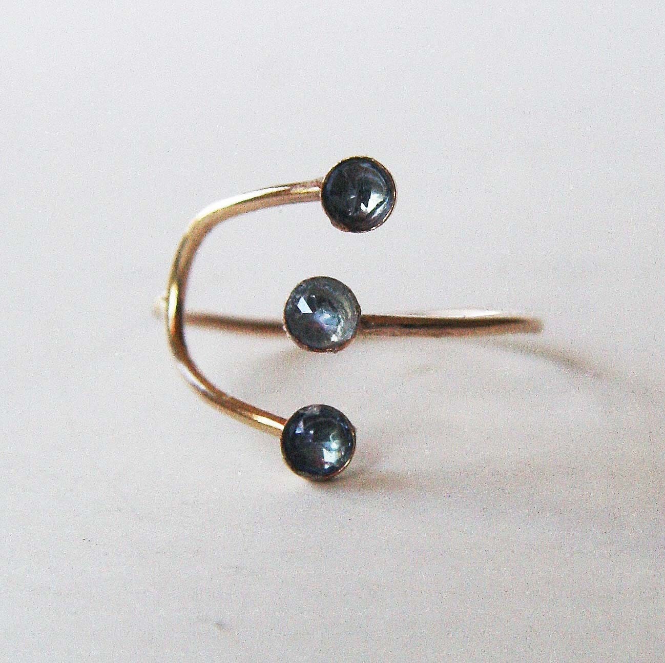 Blue Triple Topaz Curved Gold Ring