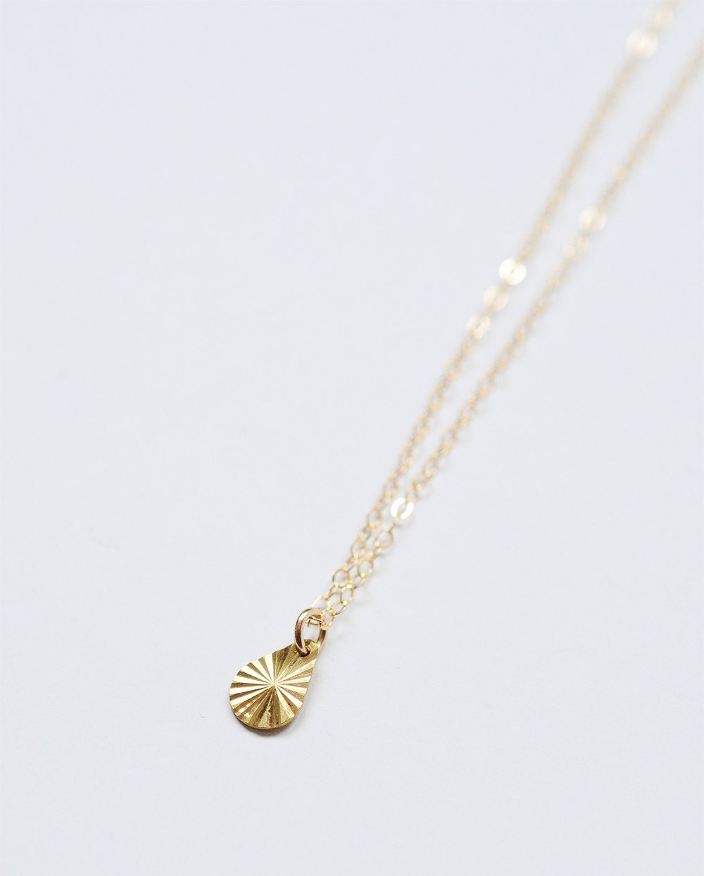 Rising Sun Gold Charm Necklace